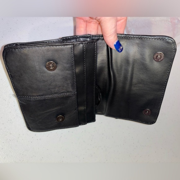 Sleek Black Messenger Bag with Adjustable Strap and Durable Material - Picture 3 of 9